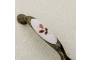Uchwyt porcelanowy 0728-PB B-brązowy kwiatek antyczny mosiądz
